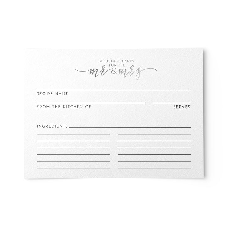 A set of newlywed recipe cards with a gold foil design and space for writing recipe names and ingredients.